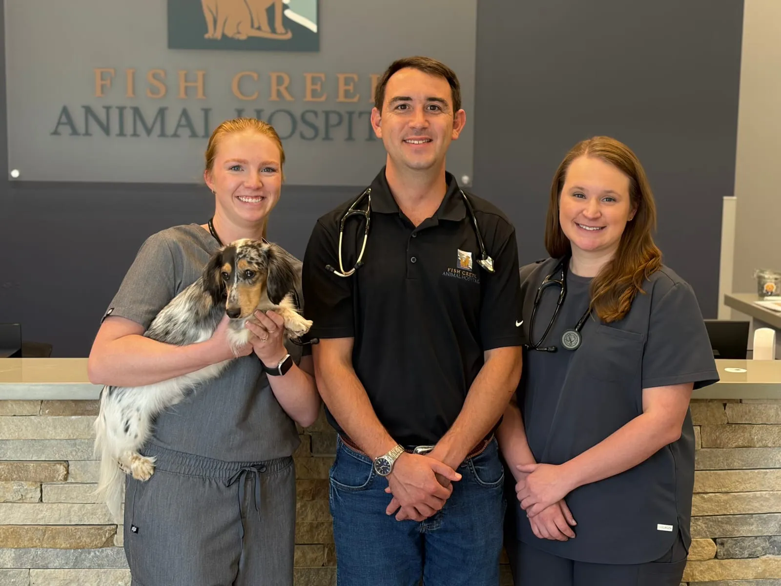 The three veterinarians of Fish Creek Animal Hospital